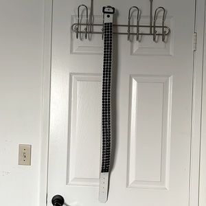 White and black large studded belt. Real leather